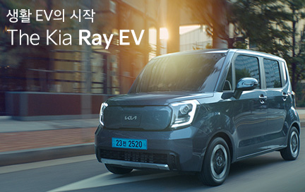 레이 EV 주행하는 측면 이미지